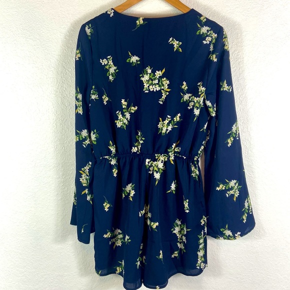 Cupcakes and Cashmere Bell Sleeve Floral Romper - Picture 10 of 10